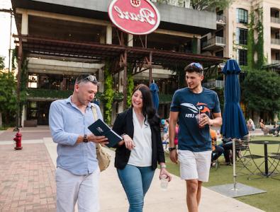 Three students walking the Pearl located Downtown of San Antonio